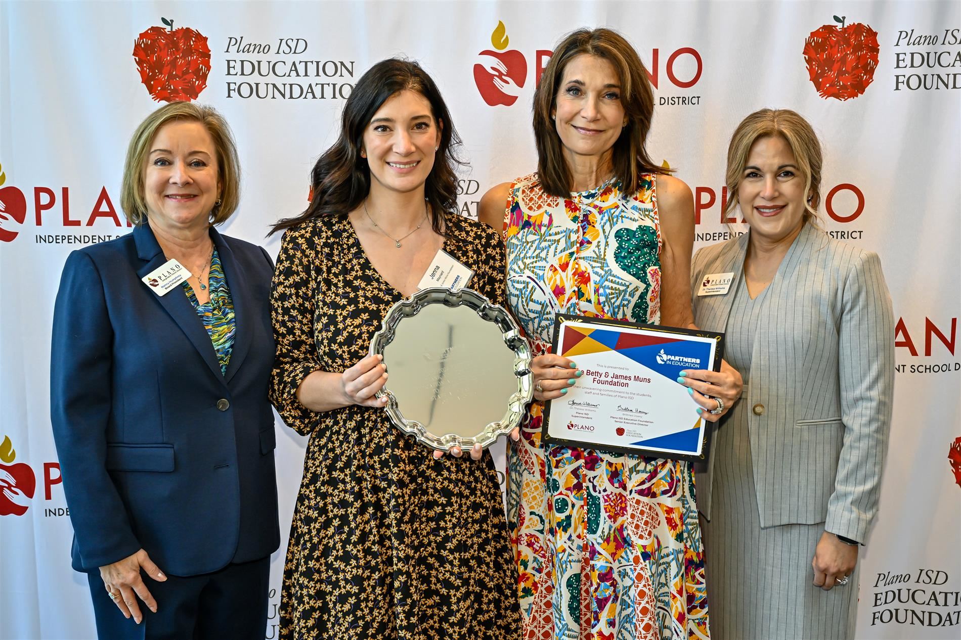 Image of Board President Nancy Humphrey, Jenna Maynard, Joa Muns and Dr. Williams